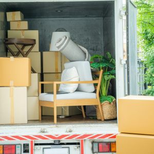 House moving service,Boxes waiting to be moved into a new home.