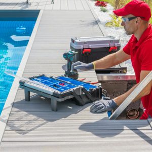 Outdoor Pool Maintenance Service Worker